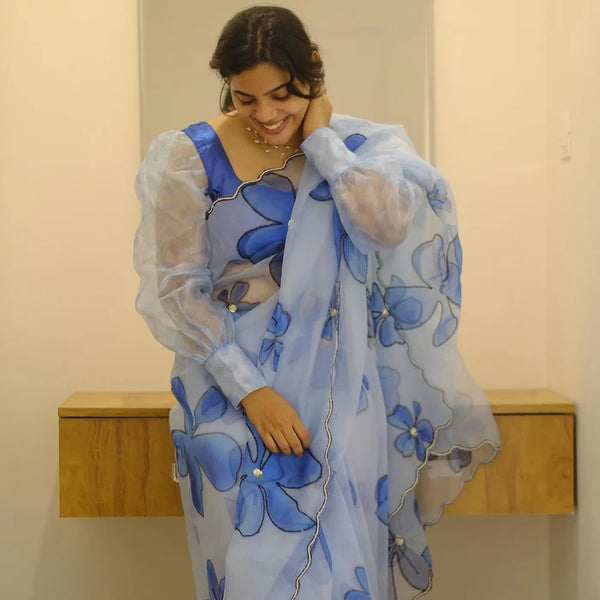 Sky Blue organza flower handprint all over saree.