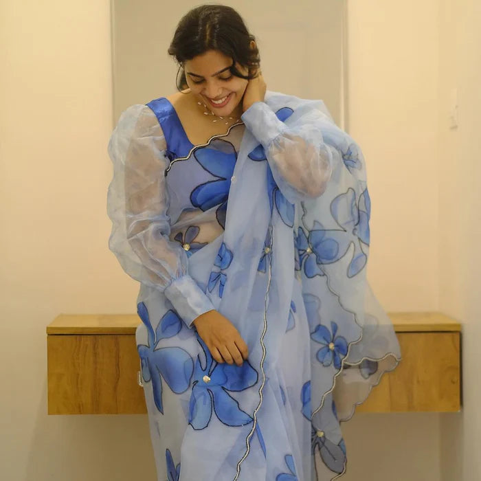 Sky Blue organza flower handprint all over saree.